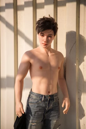 realistic-silicone-male-sex-doll-uk-caleb-standing-jeans-sunlit